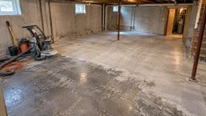 basement undergoing concrete floor preparation